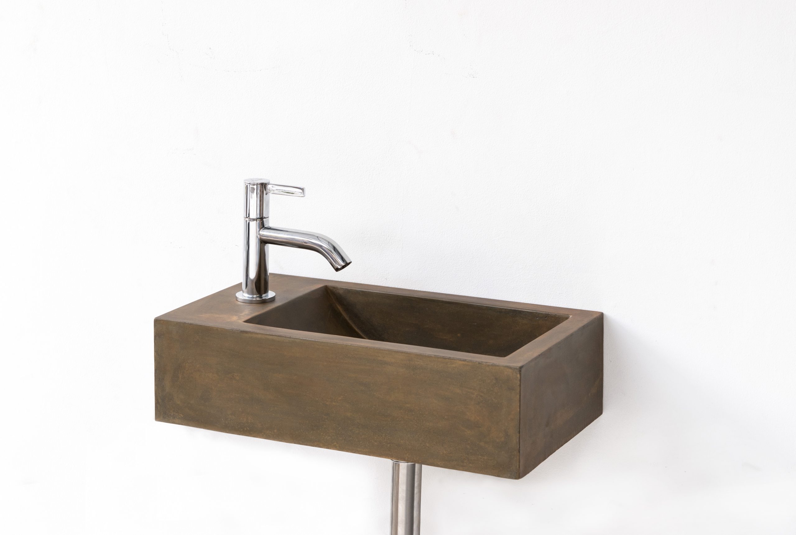 Basic Mini Right/Left wall-mounted pastel concrete basin in Sienna